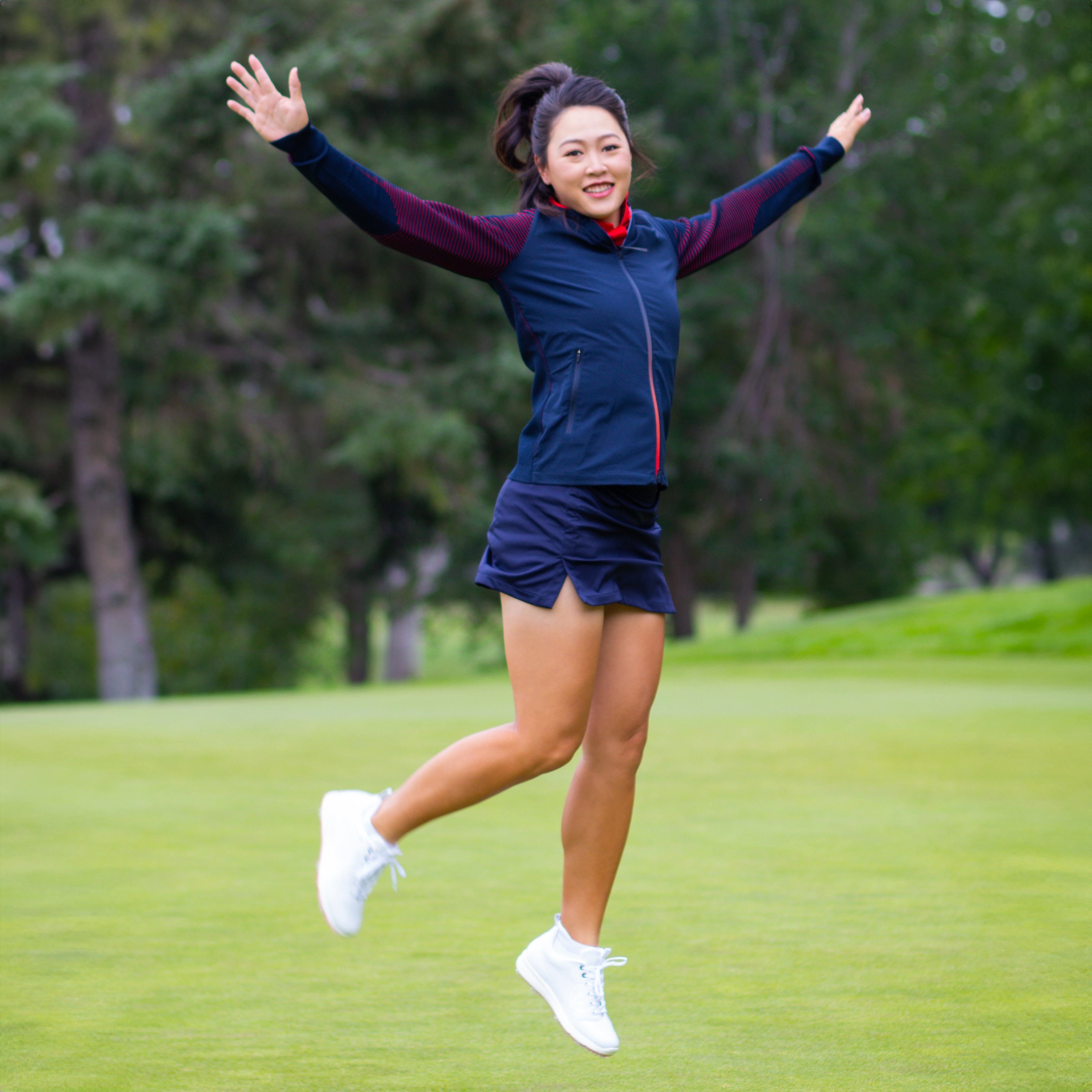 Kelly Tan wearing Women's golf shoes